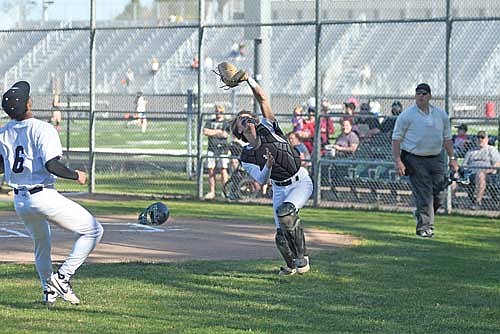 In this May 5, 2025 file photo, Ashton Bremer goes to make a catch in foul territory against Medford at the Lakeland Union High School baseball field in Minocqua. (Photo by Brett LaBore/Lakeland Times)
