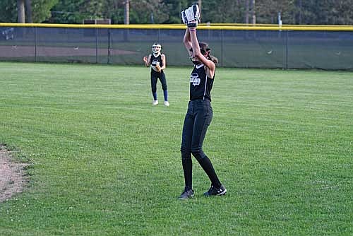 Juniper Wotachek makes a catch in right field before starting a double play in the second inning of a softball game Tuesday, June 17 at Lenz Field in Minocqua. (Photo by Brett LaBore/Lakeland Times)