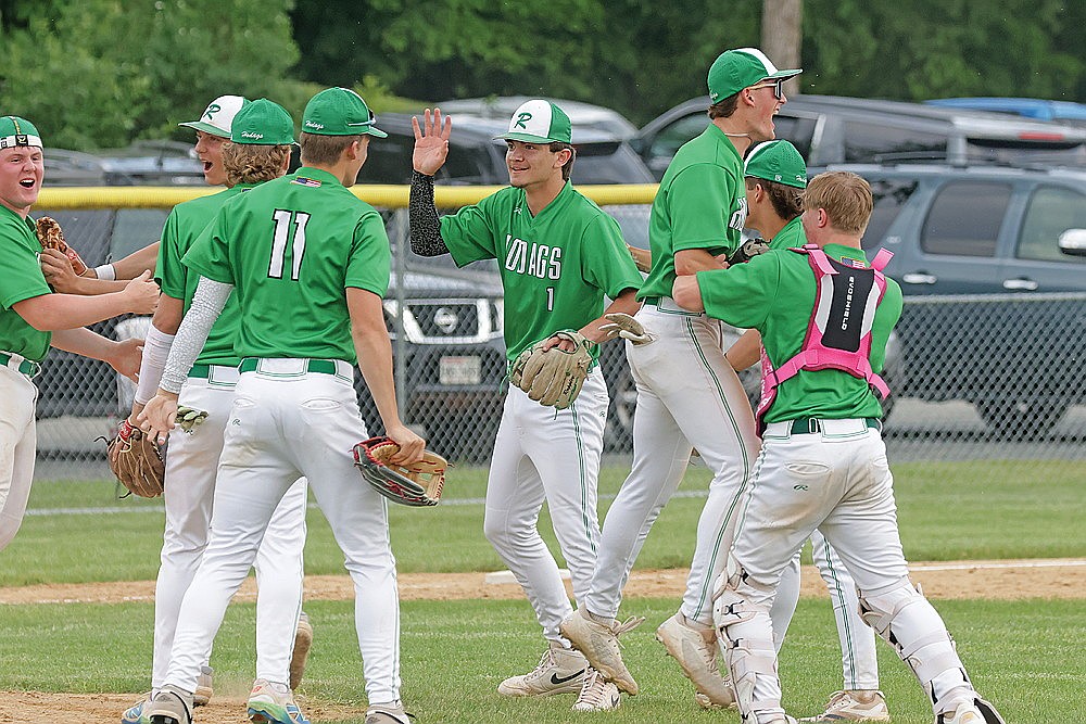 In this June 4, 2025 file photo, members of the Rhinelander High School baseball team celebrate after defeating St. Croix Falls in a WIAA Division 2 regional semifinal playoff game in St. Croix Falls. The Hodags went 13-11 on the season, a 12-win improvement from 2024. (Jeremy Mayo/River News)