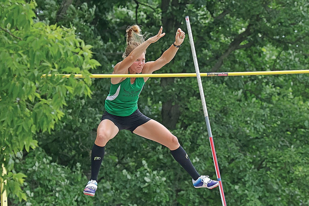 Jayme Wyss clears 12 feet in the pole vault at the Badger State Games track meet in Marathon Saturday, June 21. (Jeremy Mayo/River News)