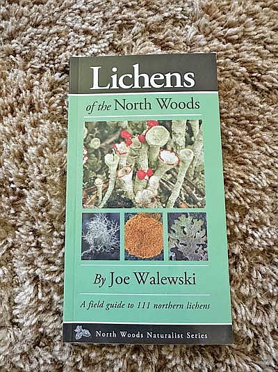 The “Lichens of the North Woods” is a great field companion for anyone looking to not only identify the lichen they see, but to learn more about lichens in general. (Photo by Beckie Gaskill/Lakeland Times)