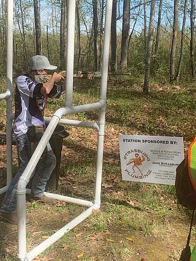 Lakeland trap shooter Colton Crass shoots at a sporting clays station during a Scholastic Clay Target Program on May 16-18 hosted by the Harshaw Sports Club. (Contributed photograph)