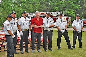 Several local veterans groups are sponsoring the Rhinelander High School Band as well as co-sponsoring The Pipes and Drums of Thunder Bay. Pictured are Bob Smith, American Legion; Tony Schoone, VFW; Bob Dionne, Northwoods Honor Guard; Dale Schlieve, parade chairman; Skip Dulin, DAV; Jerry Mueller, NCO Club; and Al Cline, AmVets. (Contributed photograph)