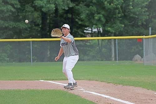 Jeffrey Bolton gets ready to make a catch at first base against Medford Monday, June 23 at Minocqua Park Complex. Bolton had two hits and RBIs. (Photo by Kate Reichl/Lakeland Times)