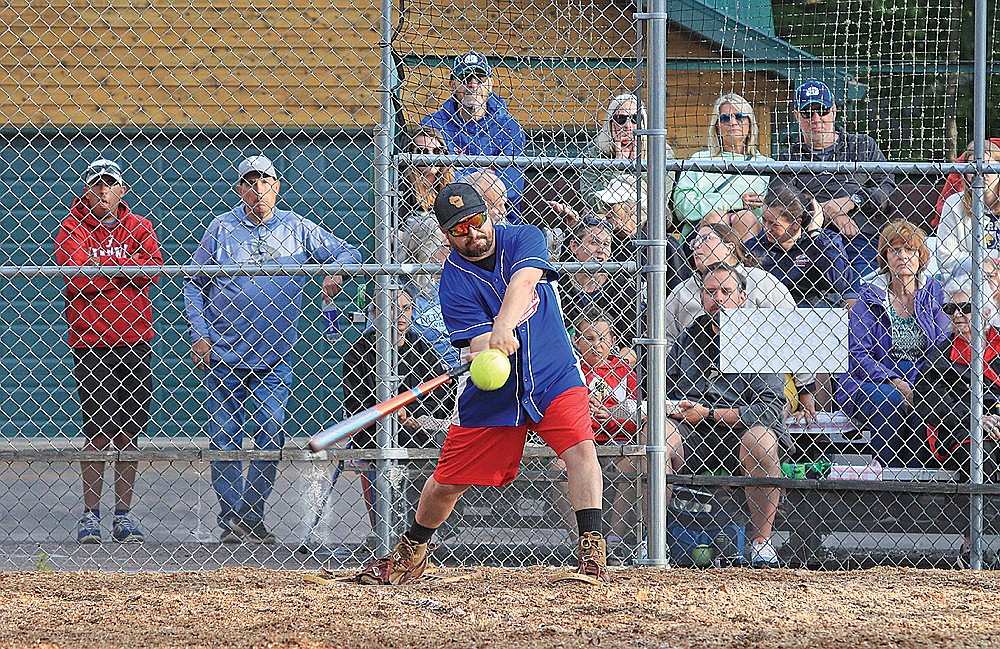 Martin Jaramillo lines up contact with the ball during a snowshoe baseball game between the Lake Tomahawk Snowhawks and the Pukall Lumber Studs in Lake Tomahawk Monday, June 30. (Michael Strasburg/Lakeland Times)