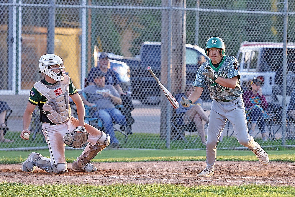 Rhinelander’s John Willoughby tossed his bat after drawing a bases-loaded walk in the third inning of an American Legion baseball game against Wittenberg-Birnamwood at Stafford Field Tuesday, July 1. (Bob Mainhardt for the River News)