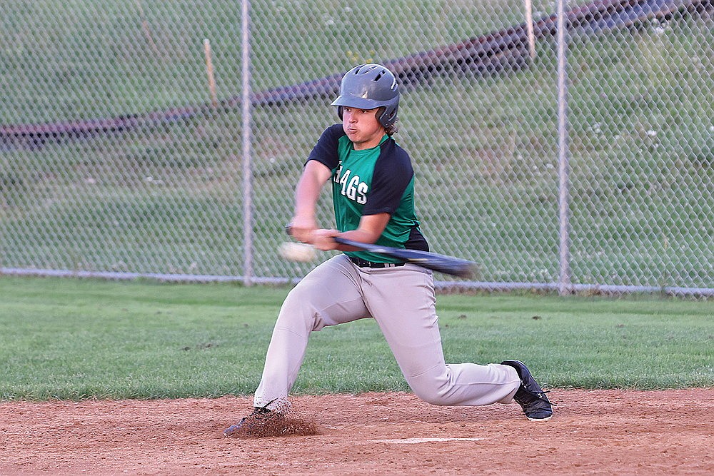 Rhinelander’s Daniel Meier hits a single in the seventh inning of a Northwoods Babe Ruth Senior League game against Tomahawk at Stafford Field Tuesday, July 8. Meier’s hit scored Brodee Dillenberg and gave the Hodags an 8-7 walkoff win over the Hatchets. (Bob Mainhardt for the River News)