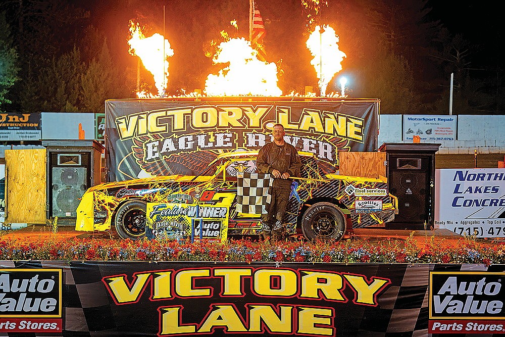 Sugar Camp’s Jason Eisel celebrates in victory lane after winning the Street Stock feature at Eagle River Speedway Tuesday, July 8. (Josh Castle/Eagle River Speedway)