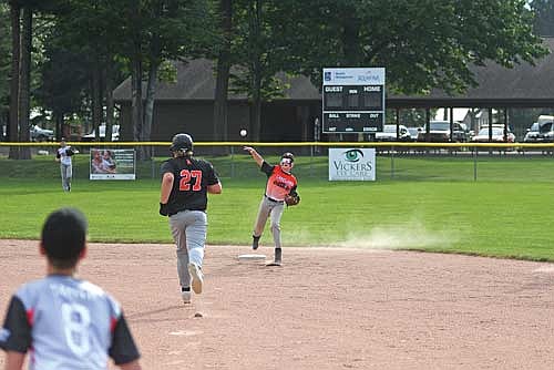 Easton Crass turns an unassisted double play in the second inning against Phillips Thursday, July 10 at the Minocqua Park Complex. (Photo by Brett LaBore/Lakeland Times)
