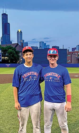 Drew Warren, left, and Jackson Waydick smile after Elite Baseball Training’s first-place victory during the Primetime Baseball High School Midwest World Series Sunday, June 29 at the University of Illinois Chicago. (Contributed photograph)