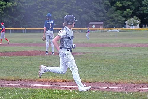 Matthew Marocco trots home for a run in the seventh inning against Northwoods Legion Wednesday, July 16 at Northland Pines High School in Eagle River. The 89ers plated three runs in the final two innings. (Photo by Brett LaBore/Lakeland Times)