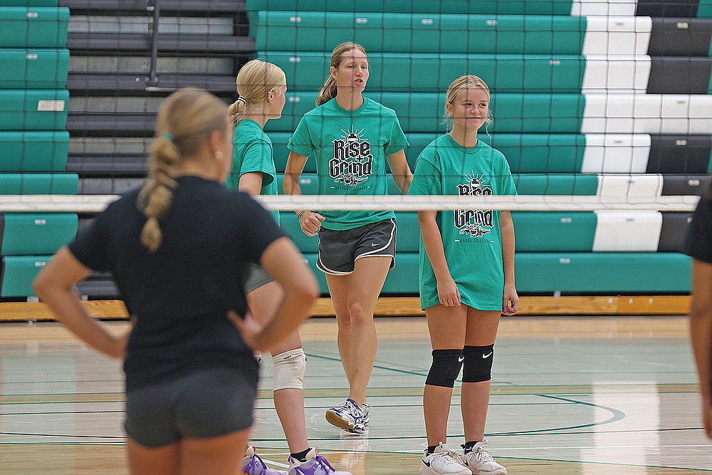 Rhinelander High School volleyball coach Jayme Wyss instructs players during team camp Tuesday, July 22 at the Jim Miazga Community Gymnasium. (Bob Mainhardt for the River News)