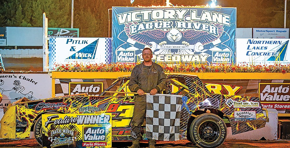 Sugar Camp’s Jason Eisel celebrates in victory lane after winning the Street Stock feature at Eagle River Speedway Tuesday, July 22. (Josh Castle/Eagle River Speedway)