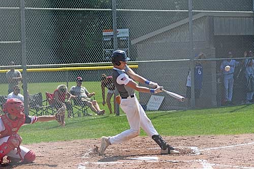 Danny Gahler hits an RBI triple in the third inning of a Wisconsin AA American Legion regional tournament game against Antigo Friday, July 25 at the Minocqua Park Complex. (Photo by Brett LaBore/Lakeland Times)
