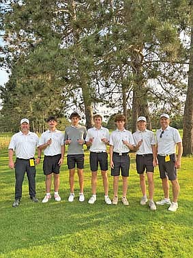 The Lakeland golf team holds up their hardware after a second-place finish at a WIAA Division 2 sectional meet June 4 at Hayward Golf Course. Members of the team, from left, are head coach Scott Howard, Talan Pockat, Jeremy Hensen, Davis Kock, Jaydan Schilling, Michael Melka and coach Matt Kock. The Thunderbirds punched their ticket to state for an eighth straight season. (Contributed photograph)