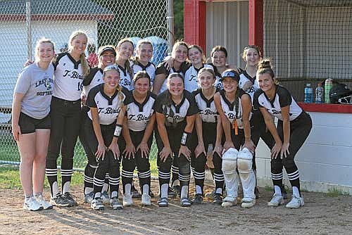 In this June 4, 2025 file photo, Lakeland softball celebrates a 2-1 win over Medford in a WIAA Division 2 sectional semifinal game at Raider Field in Medford. Pictured, back row from left, are manager Ellie Baker, Saylor Timmerman, Rayna Hella, Ciara Christianson, Sarah Barton, Savanah Kemnitz, Addison Trapp, Marlee Strasburg, Stevie Jurries; front row, Ali Timmerman, Moriah Louis, Karlin Williams, Allyson Seaberg, Lani Frisch and Malia Newport. (Photo by Brett LaBore/Lakeland Times)