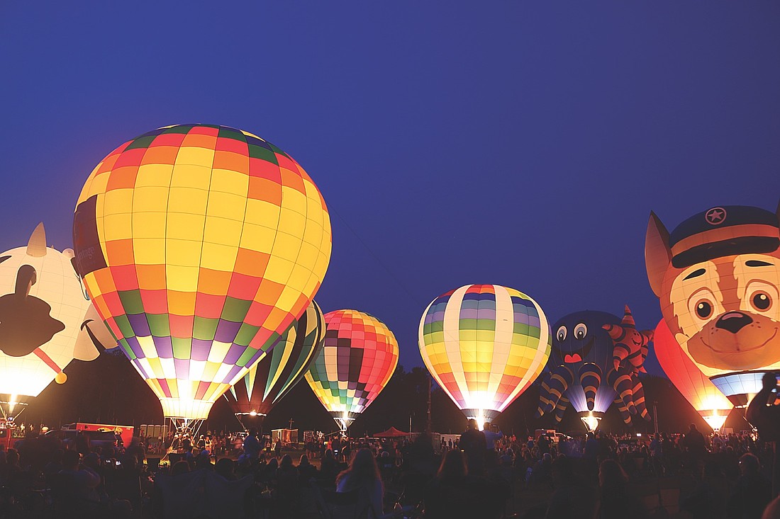 Balloons are lit up during the Musical Balloon Glow. (Photo by Kate Reichl/Lakeland Times)