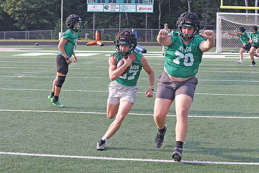 Cyrus Leisure carries the ball during Rhinelander High School football practice at Mike Webster Stadium Tuesday, Aug. 5. Leisure, a senior, was the leading rusher for the Hodags last year, amassing 470 yards and three touchdowns. (Bob Mainhardt for the River News)