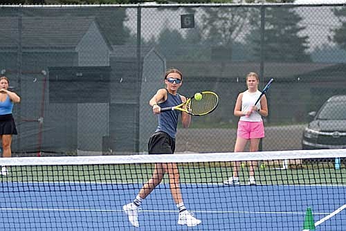Sierra Wallace hits a backhanded groundstroke during the first day of practice Tuesday, Aug. 12 at the Lakeland Union High School tennis courts in Minocqua. Wallace is moving up to No. 1 singles this season. (Photo by Brett LaBore/Lakeland Times)