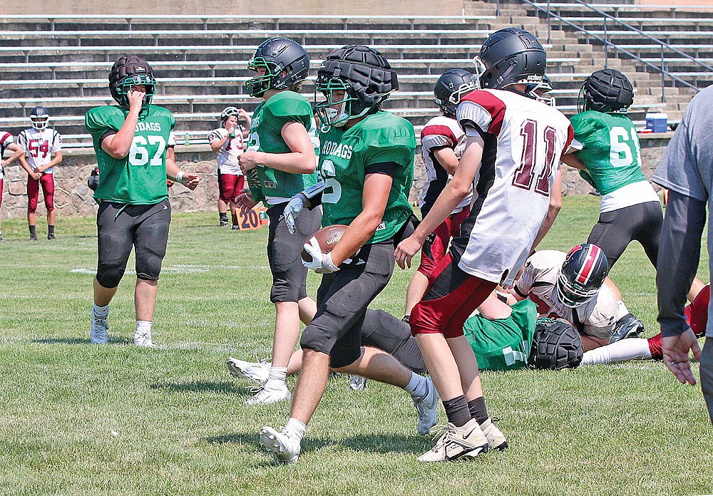 Rhinelander’s Josh Willoughby scores a touchdown during a football scrimmage against Crandon in Antigo Friday, Aug. 15. Willoughby unofficially finished with 23 yards and two touchdowns on seven carries for the Hodags in the scrimmage. (Bob Mainhardt for the River News)