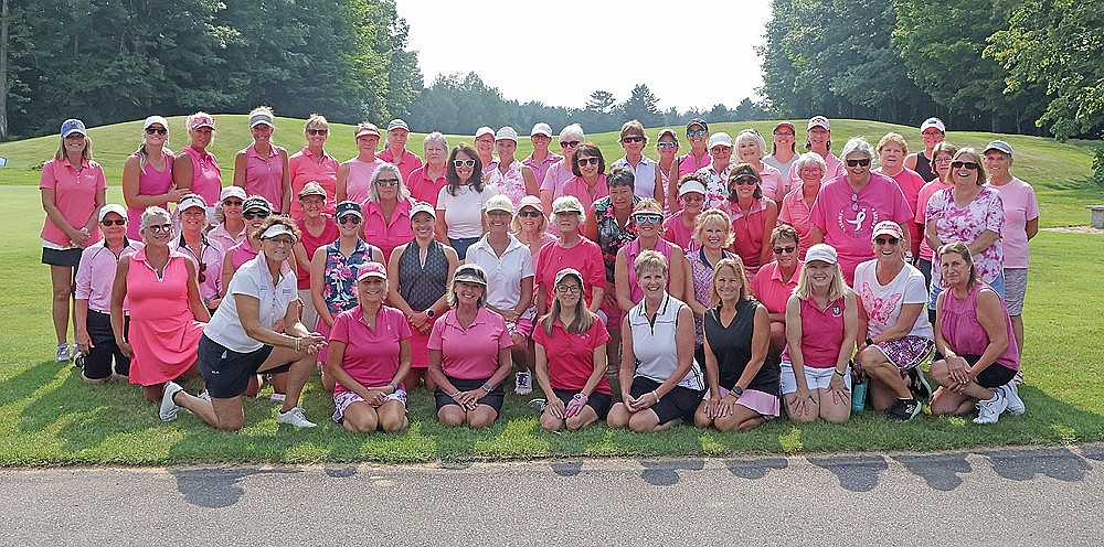 Members of the Northwood Golf Club Ladies League and Inshalla Country Club Ladies League pose for a photograph prior to their annual breast cancer awareness event at Northwood Golf Club Tuesday, Aug. 5. This year’s event raised $8,300 that will be split between the James Beck Cancer Center at Aspirus Rhinelander Hospital and The Ties that Bind us at Aspirus Tomahawk Hospital. (Jeremy Mayo/River News)
