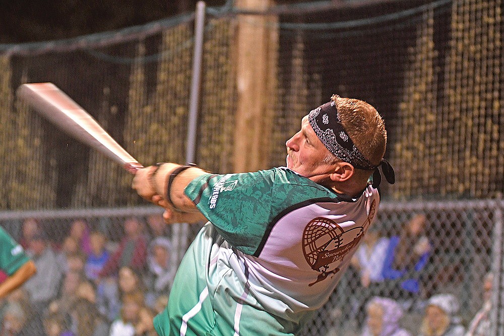 Benny Ives of Dazzle’s Demons flies out in the sixth inning of a game against the Snowhawks Monday, Aug. 18 at Snowshoe Park in Lake Tomahawk. (Brett LaBore/Lakeland Times)