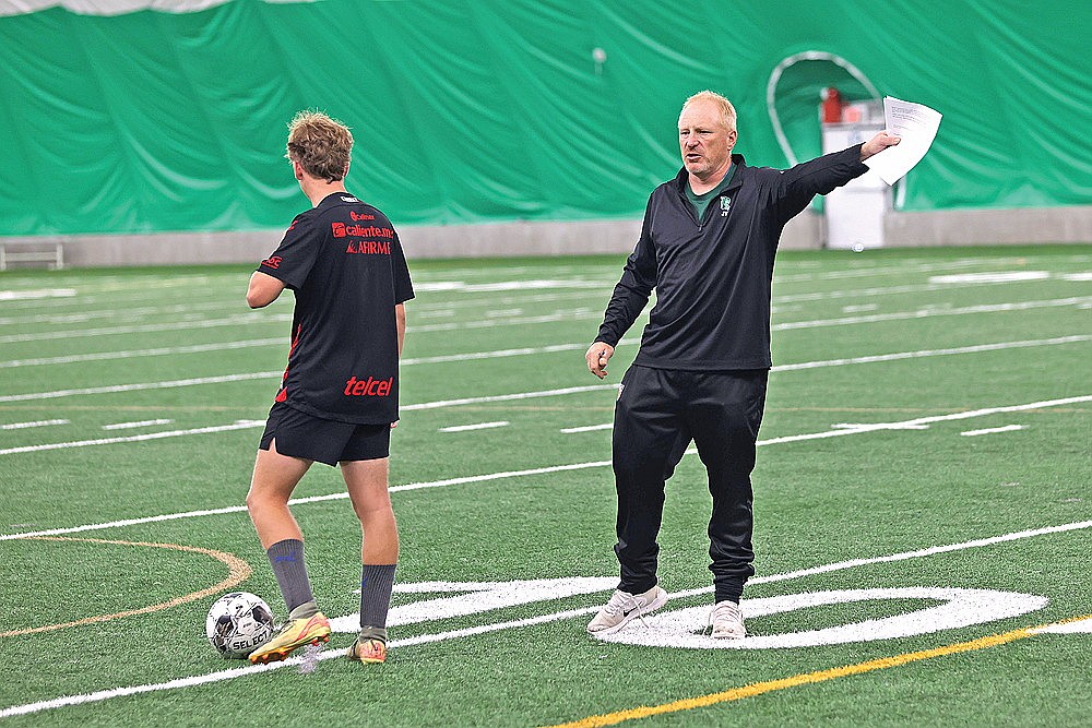 Coach John Vojta gives instructions during Rhinelander High School boys’ soccer practice in the Hodag Dome Monday, Aug. 18. Monday marked Vojta’s first official practice as head coach of the Hodags. (Bob Mainhardt for the River News)
