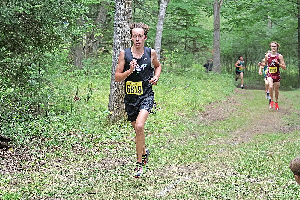 In this Aug. 29, 2024 file photo, Rhinelander’s Avrom Barr runs in the woods during the Hodag Invite cross country race in Rhinelander. Barr is the top returning runner for the Hodag boys’ this season after finishing 44th last year in the WIAA Division 2 state meet. (Jeremy Mayo/River News)