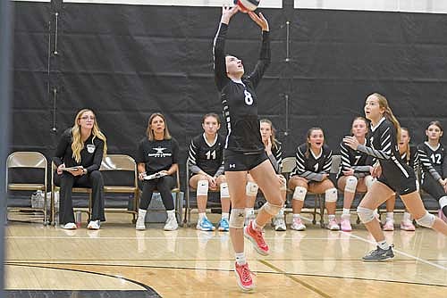 Allyson Seaberg sets the ball for Vivian Pertile during a scrimmage against Mercer Saturday, Aug. 23 at the Lakeland Union High School fieldhouse in Minocqua. (Photo by Brett laBore/Lakeland Times)