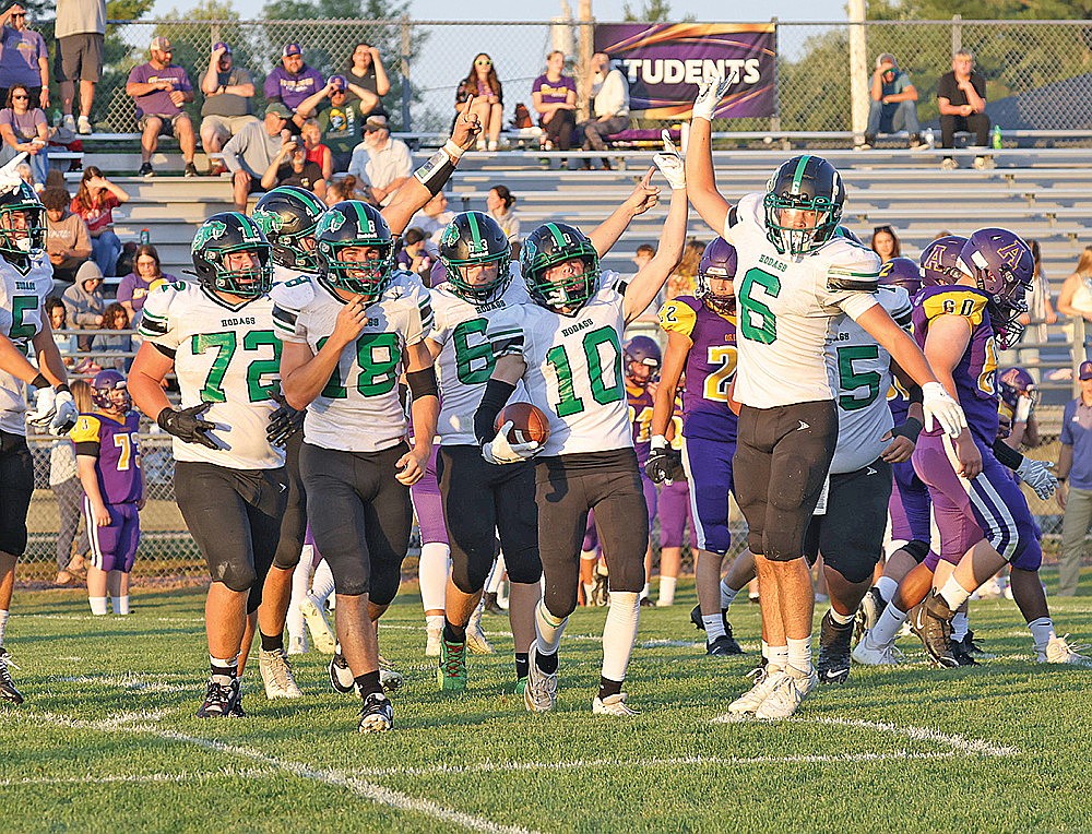 The Rhinelander High School football team celebrates a fumble recovery by Weston Kibler (10) during the first half of a non-conference game at Ashland Friday, Aug. 22. The Hodags are looking to bounce back from an overtime loss to the Oredockers as they face Hayward at home tonight. (Bob Mainhardt for the River News)