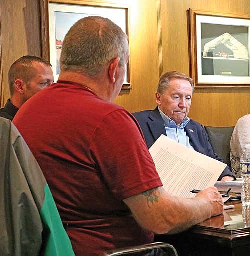 Trig Solberg, right, and Jesse Birginal, left, of Lakeland Aviation spoke with the airport commission chair Patrick Marquardt, center, about taking over Rhinelander Flying Service at the Aug. 29 Airport Commission Meeting in Rhinelander. (Photo by Beckie Gaskill/Lakeland Times)