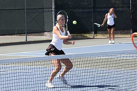 Rhinelander’s Willow VanDenHeuvel plays a point at the net during a girls’ tennis match against Ironwood, Mich. at the RHS tennis courts Friday, Aug. 29. (Photo by Bob Mainhardt/River News)
