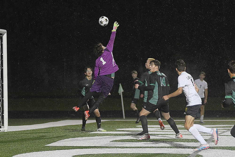Caden Ehrhardt tries to deflect the ball away during the first half of a conference game against Lakeland Thursday, Sept. 4 at Mike Webster Stadium in Rhinelander. (Brett LaBore/Lakeland Times)