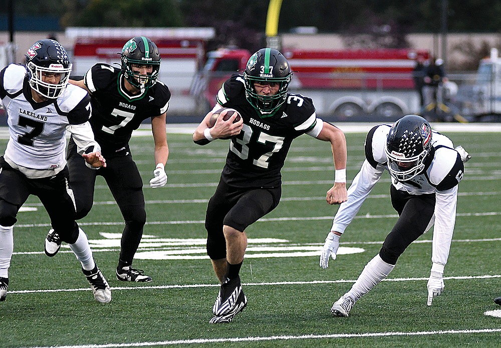 Rhinelander’s Cyrus Leisure takes it to the house for a touchdown in the first quarter of the Axe Game against Lakeland Friday, Sept. 5 at Mike Webster Stadium in Rhinelander. The Thunderbirds beat the Hodags for a fourth straight season by a 43-32 score in the highest-scoring Axe Game since 2017. A full report will appear Friday, Sept. 12 edition of the River News. (Brett LaBore/Lakeland Times)