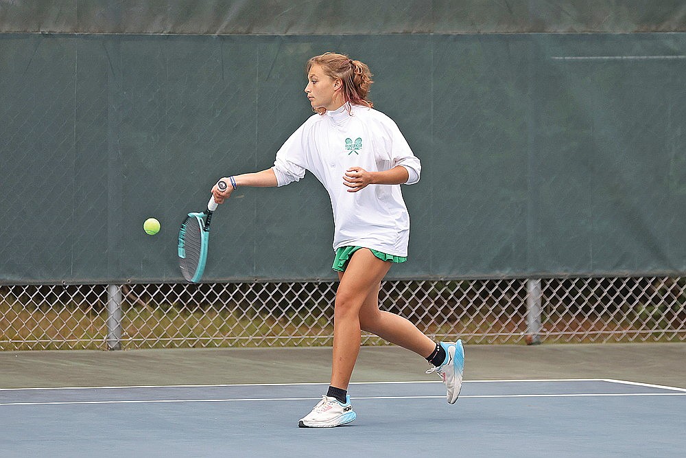 Rhinelander’s Willow Mutter hits a return during a GNC girls’ tennis match against Medford at the RHS tennis courts Thursday, Sept. 4. Mutter and No. 3 doubles teammate Addy Currie won their match in a tiebreaker, one of three match tiebreaker wins for the Hodags in a 5-2 victory over the Raiders. (Bob Mainhardt for the River News)