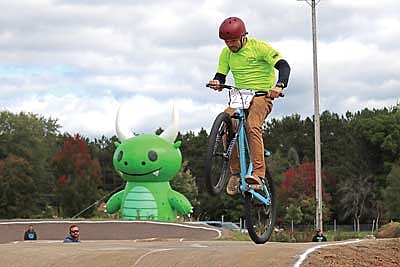 Eddie Bauer of Rhinelander catches air on a jump during the Wisconsin BMX State Championship race held at Rhinelander’s West Side Park Sunday, Sept. 7. The race, which determined the state’s best riders for the year in 64 different divisions, attracted more than 300 riders to town, according to Hodag BMX track operator Robbie Deede. For more photos from the event, see Page 7. (Photo by Kate Reichl/Lakeland Times)