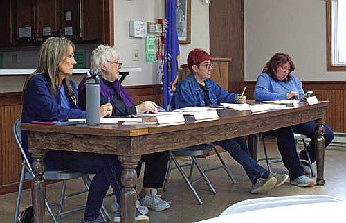 The Nokomis town board took up the matter of sending a letter of opposition to the proposed roundabout at the intersection intersection of U.S. Highway 51, County Highway K and Swamp Lake Road. Pictured, from left, are supervisor Cheyann Wilke, supervisor Bette Stillman, town clerk Wendy Smith and treasurer Judy Asmondy. (Photo by Beckie Gaskill/Lakeland Times)