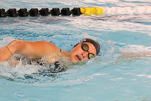 Callie Baker swims the 200 freestyle in a conference double dual against Medford and Merrill Thursday, Sept. 11 at the Medford Area Senior High School pool. (Photo by Matt Frey/Star News)