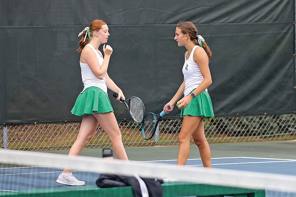 Rhinelander’s Maddie Legrey, left, and Teagan Turcotte celebrate a point by touching racquets during a GNC girls’ tennis dual against Merrill at the RHS tennis courts Thursday, Sept. 11. Legrey and Turcotte won their match at No. 1 doubles in straight sets, part of a 6-1 victory over the Bluejays that moved the Hodags into second in the conference standings. (Bob Mainhardt for the River News)