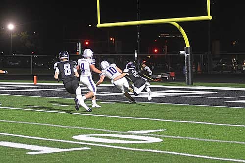 Justin Baird tackles Mosinee punter Mitchell Michlig near the end zone in the second quarter of a conference game Friday, Sept. 12 at IncredibleBank Field in Minocqua. The turnover on downs led to a Justin Doud-Sero touchdown to put Lakeland up 24-7 at halftime. (Photo by Brett LaBore/Lakeland Times)