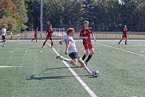 Marshall Holmquist gears up to advance the ball in a non-conference game against Shawano Saturday, Sept. 13 at Mike Webster Stadium in Rhinelander. (Photo by Bob Mainhardt for the River News)