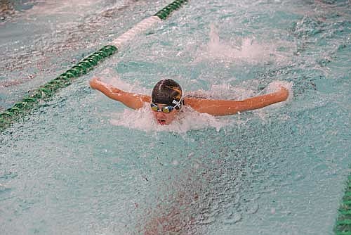 Abby Mickle does the 100 butterfly during a conference dual with Rhinelander Thursday, Sept. 18 at the Heck Family Community Pool in Rhinelander. (Photo by Bob Mainhardt for the River News)
