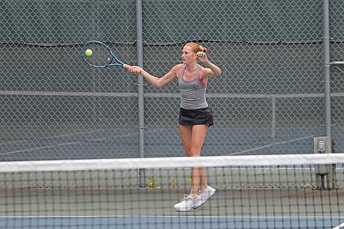 Nora DeVries connects with the ball in her No. 1 doubles match against Rhinelander Thursday, Sept. 18 at the Rhinelander High School tennis courts. DeVries paired up with Addison Trapp for the first time this season. (Photo by Jeremy Mayo/River News)