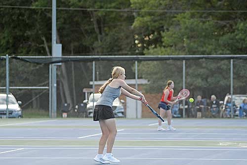Carmen Istudor sends the ball back in her No. 3 doubles match against Pacelli Tuesday, Sept. 23 at the Lakeland Union High School tennis courts in Minocqua. (Photo by Brett LaBore/Lakeland Times)