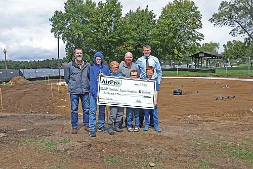 Pictured for the check presentation, from left, are, back row, Sean Codere from AirPro, Dave Wingard from AirPro, Brandon Karaba from Rhinelander Kiwanis Club, front row, Brendan Wingard, Aaron Wingard, Quincy Wingard, Adam Wingard. (Contributed photograph)
