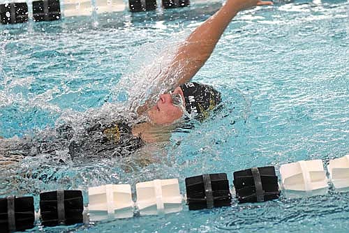 Molly Jorgensen swims the backstroke leg of the 200 IM in a conference dual against Ladysmith Co-op Thursday, Sept. 25 at the Lakeland Union High School pool in Minocqua. Jorgensen finished with a time of 2:39.06, a new personal best. (Photo by Brett LaBore/Lakeland Times)