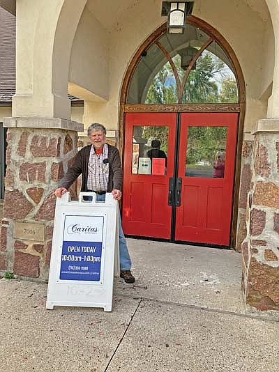Caritas board chairman Dick Bruesehoff stands outside the Caritas office at St. Matthias Church. (Contributed photograph)