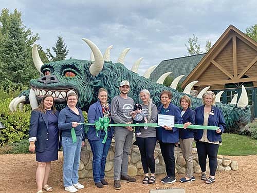 Those present for the ribbon cutting are: from left, Lauren Sackett, Tiki Krueger-Boehm, Jessica Mellinger, Jeremiah Snyder, Mercedes Snyder, Raquel Snyder, Linda Krebsbach, Diane Sowinski and Tarsie Goes. (Contributed photograph)