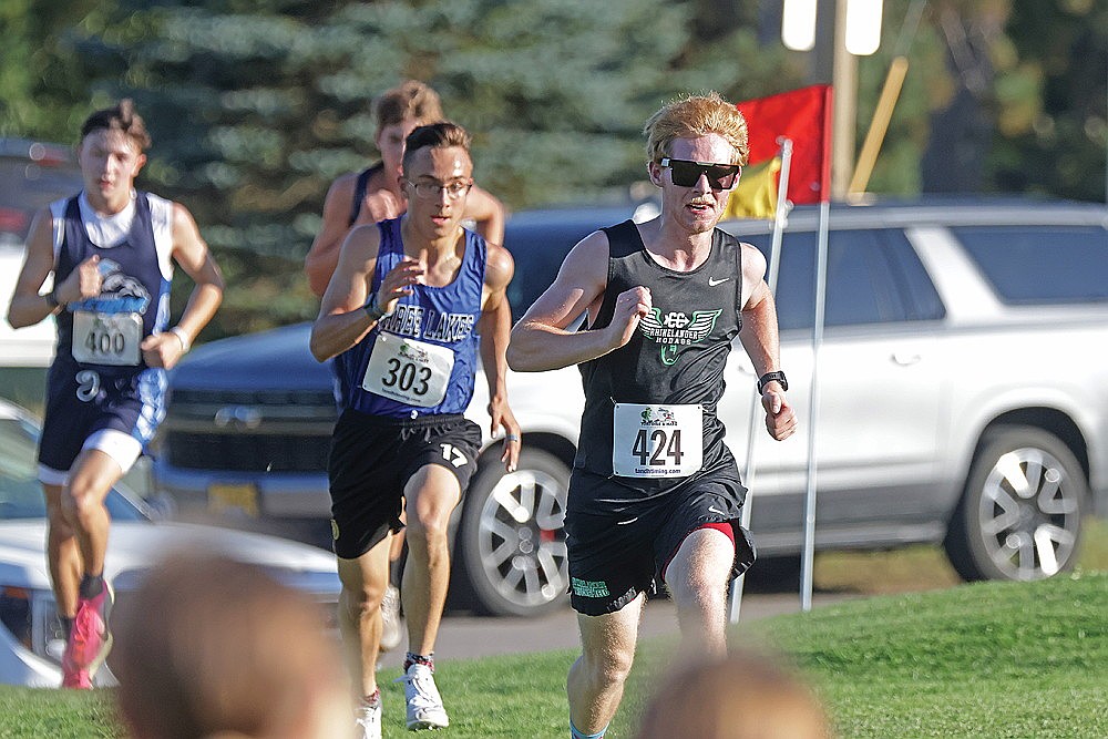Rhinelander’s Jonathan Campbell leads a pack of runners toward the finish of the Three Lakes Invite cross country race at Big Stone Golf Course Thursday, Sept. 25. Campbell finished 10th for the Hodags, who won the meet by seven points over Lakeland. (Jeremy Mayo/River News)