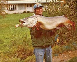 Influential Wisconsin angler Gene Allen poses with the catch of a lifetime: a 53 and 1/2 inch musky, weighing 51 pounds. The massive fish was caught on Flambeau Lake in Lac du Flambeau on Sept. 21, 1975. (Contributed photograph)